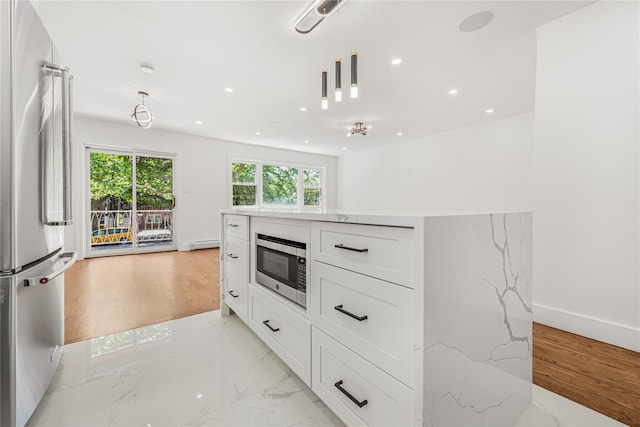 567 E 80th St, Brooklyn, NY 11236 - kitchen featuring stainless steel appliances, light stone counters, white cabinets, recessed lighting, and decorative light fixtures