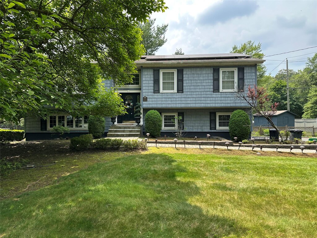 43 N Lorna Ln, Airmont, NY 10901 - view of front facade featuring roof mounted solar panels