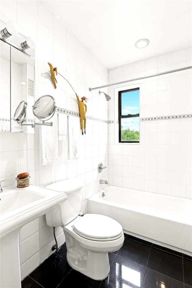 690 Riverside Dr Unit 5E, New York Manhattan, NY 10031 - full bath featuring tile walls, shower / washtub combination, toilet, and granite tiled floors