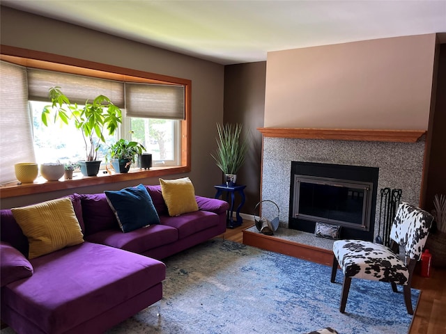 70 Pacific St, North Babylon, NY 11703 - living room with wood finished floors and a tile fireplace