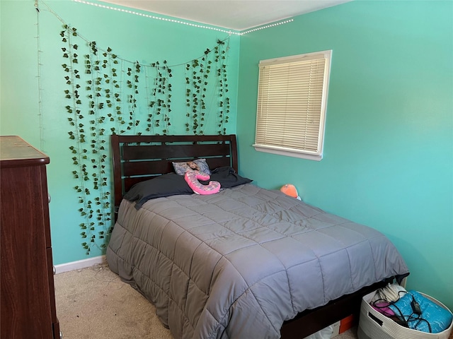 70 Pacific St, North Babylon, NY 11703 - bedroom with carpet and baseboards