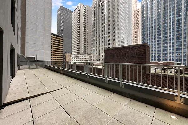 135 W 52nd St Unit 8D, New York Manhattan, NY 10019 - balcony featuring a city view