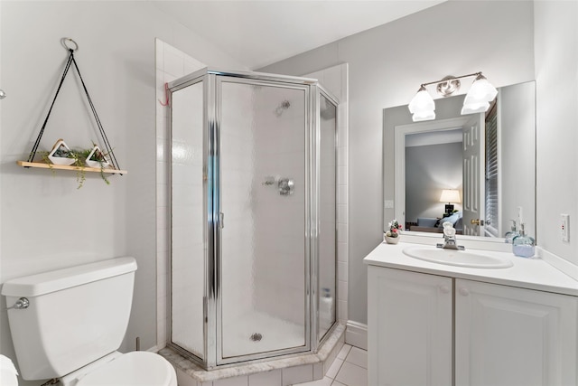 19 Rock Hill Ln, Scarsdale, NY 10583 - ensuite bathroom featuring toilet, a shower stall, vanity, and tile patterned flooring