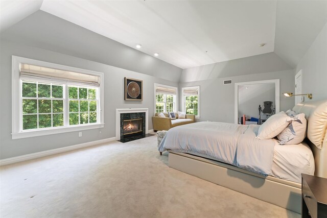 19 Rock Hill Ln, Scarsdale, NY 10583 - carpeted bedroom with lofted ceiling, baseboards, and a high end fireplace
