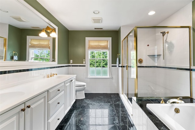 19 Rock Hill Ln, Scarsdale, NY 10583 - bathroom featuring plenty of natural light, double vanity, tile walls, a shower stall, and a wainscoted wall
