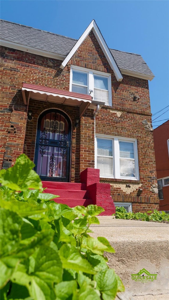 204-03 Murdock Ave, Saint Albans, NY 11412 - property entrance featuring brick siding