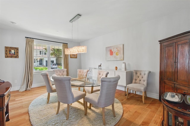 9 Constance Ave, Dobbs Ferry, NY 10522 - dining area with light wood-style flooring and baseboards