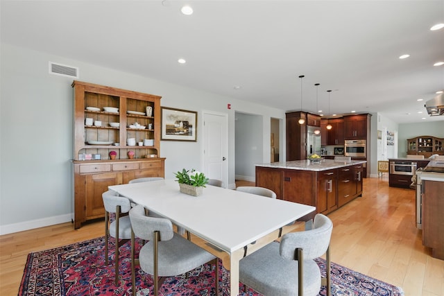 9 Constance Ave, Dobbs Ferry, NY 10522 - dining area with light wood-style flooring, recessed lighting, and baseboards