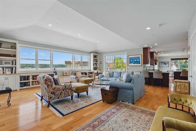 9 Constance Ave, Dobbs Ferry, NY 10522 - living room with healthy amount of natural light, light wood-style floors, recessed lighting, and lofted ceiling