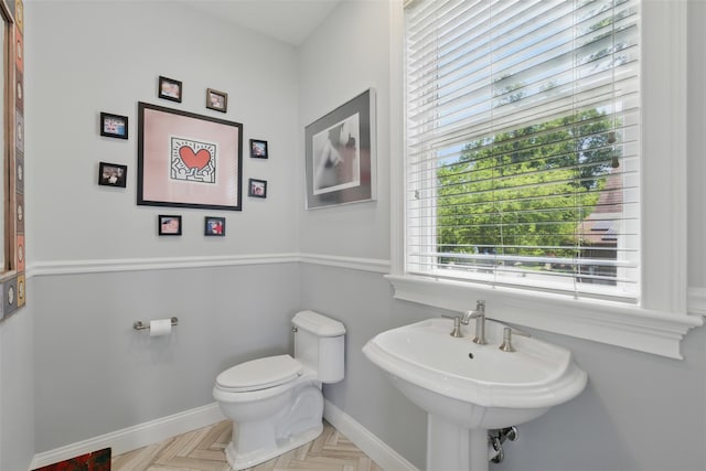 9 Constance Ave, Dobbs Ferry, NY 10522 - half bath with toilet, baseboards, and a sink