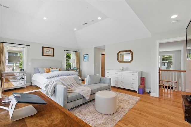 9 Constance Ave, Dobbs Ferry, NY 10522 - bedroom with multiple windows, light wood finished floors, recessed lighting, vaulted ceiling, and baseboards