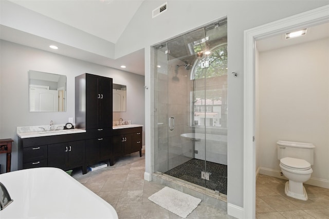 9 Constance Ave, Dobbs Ferry, NY 10522 - full bath with a stall shower, a soaking tub, vaulted ceiling, double vanity, and tile patterned floors