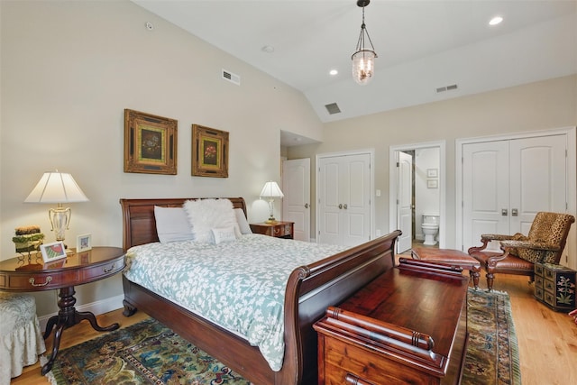 9 Constance Ave, Dobbs Ferry, NY 10522 - bedroom with lofted ceiling, wood finished floors, recessed lighting, and ensuite bath
