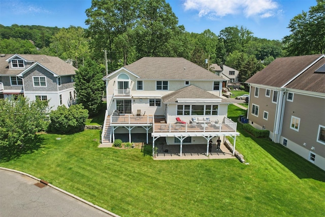 9 Constance Ave, Dobbs Ferry, NY 10522 - back of house featuring a wooden deck, a patio, a yard, and stairs