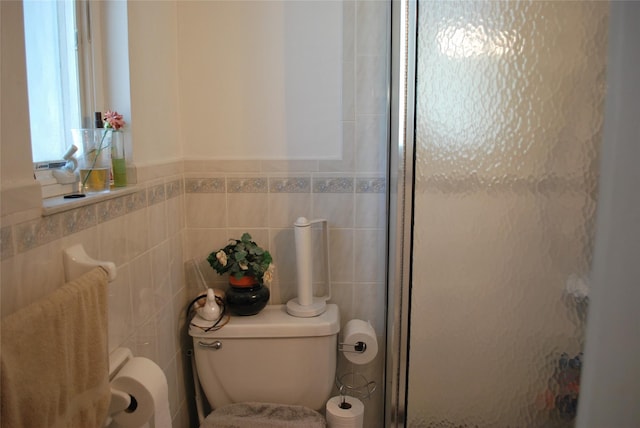 4026 208th St, Bayside, NY 11361 - bathroom featuring a shower stall and tile walls