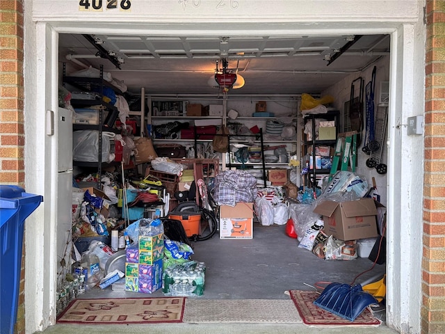 4026 208th St, Bayside, NY 11361 - garage featuring a garage door opener