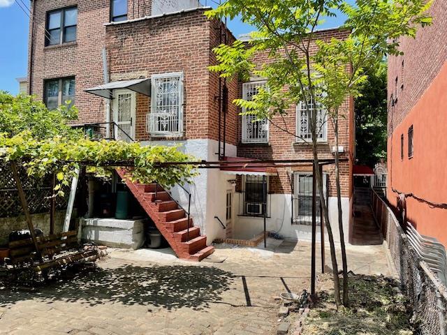 32-17 46th St, Astoria, NY 11103 - back of property featuring brick siding