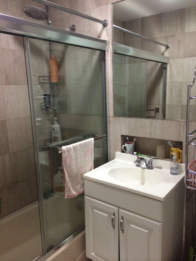 4231 Colden St Unit R6C, Flushing, NY 11355 - bathroom featuring vanity and combined bath / shower with glass door