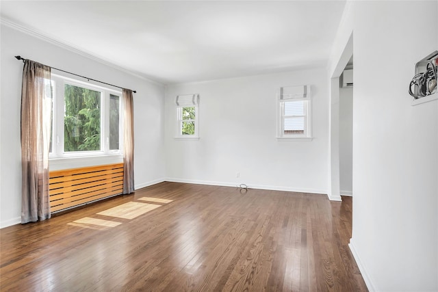 7931 211th St, Oakland Gardens, NY 11364 - empty room with hardwood / wood-style floors and baseboards