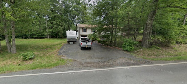 589 County Route 56, Wurtsboro, NY 12790 - view of property hidden behind natural elements featuring asphalt driveway