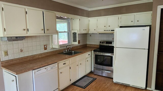 48 Julie Dr, Hopewell Junction, NY 12533 - kitchen with white appliances, a sink, range hood, crown molding, and light wood-type flooring