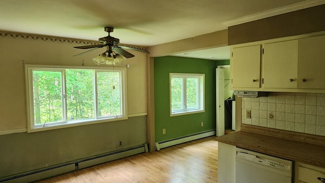 48 Julie Dr, Hopewell Junction, NY 12533 - kitchen featuring baseboard heating, white dishwasher, light wood-type flooring, and backsplash
