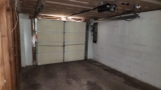 48 Julie Dr, Hopewell Junction, NY 12533 - garage featuring a garage door opener and electric panel