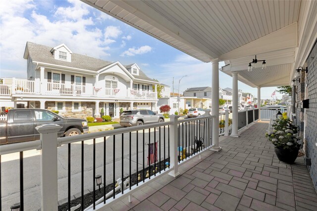 27 Armour St, Long Beach, NY 11561 - covered porch featuring a residential view
