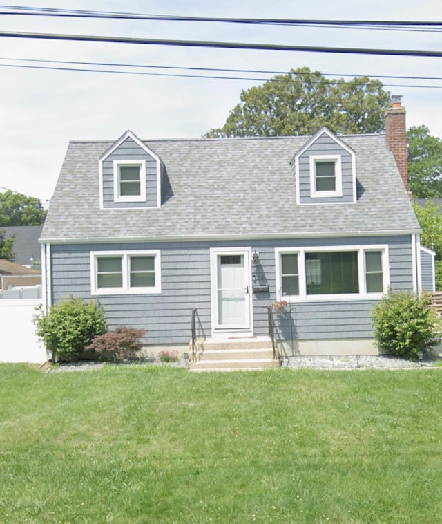 26 Richard Ave, Ronkonkoma, NY 11779 - new england style home with a chimney and a shingled roof