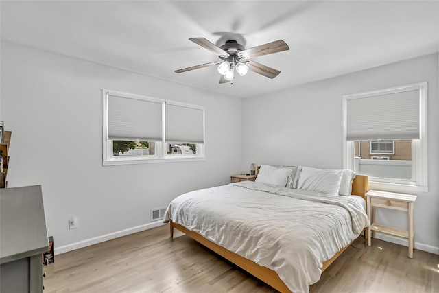 26 Richard Ave, Ronkonkoma, NY 11779 - bedroom featuring light wood finished floors and ceiling fan