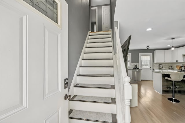26 Richard Ave, Ronkonkoma, NY 11779 - stairway featuring recessed lighting and wood finished floors