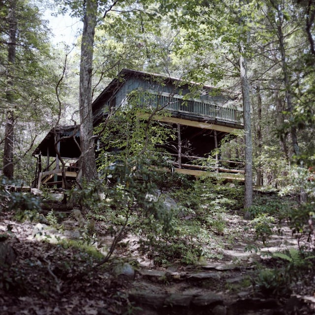 215 Little Pond Rd, Pawling, NY 12564 - back of house with a wooden deck and a forest view