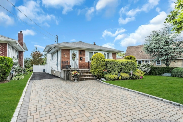 1197 Tulip Ave, Franklin Square, NY 11010 - view of front facade featuring brick siding