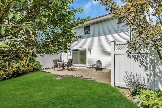 1197 Tulip Ave, Franklin Square, NY 11010 - rear view of property featuring a patio