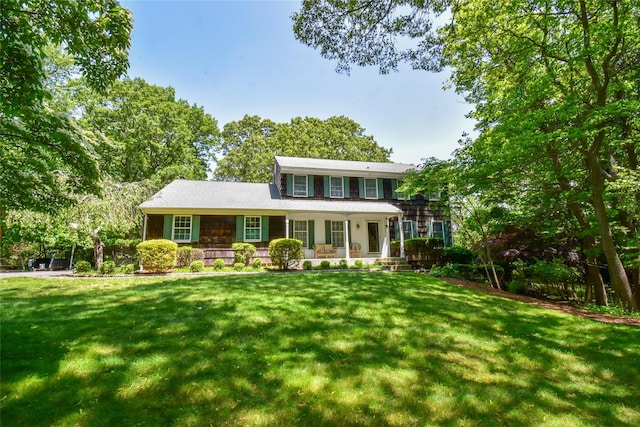 12 Cordwood Path, Shoreham, NY 11786 - view of front of property with covered porch and a front yard