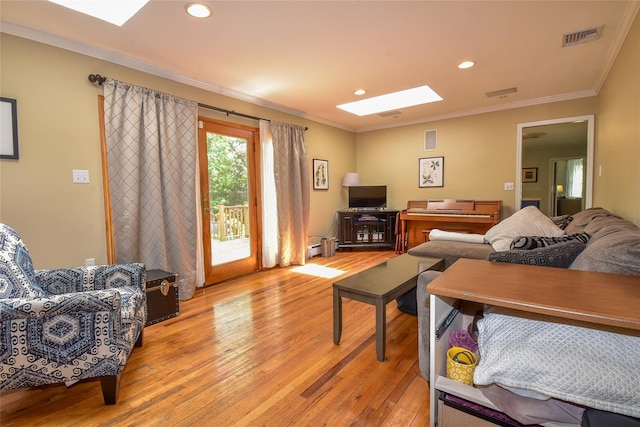 12 Cordwood Path, Shoreham, NY 11786 - living room featuring a skylight, light wood-type flooring, crown molding, and recessed lighting