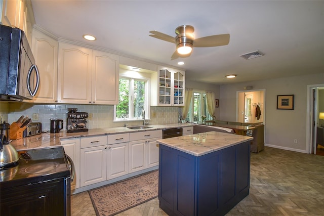 12 Cordwood Path, Shoreham, NY 11786 - kitchen with a sink, a peninsula, electric stove, black dishwasher, and white cabinets