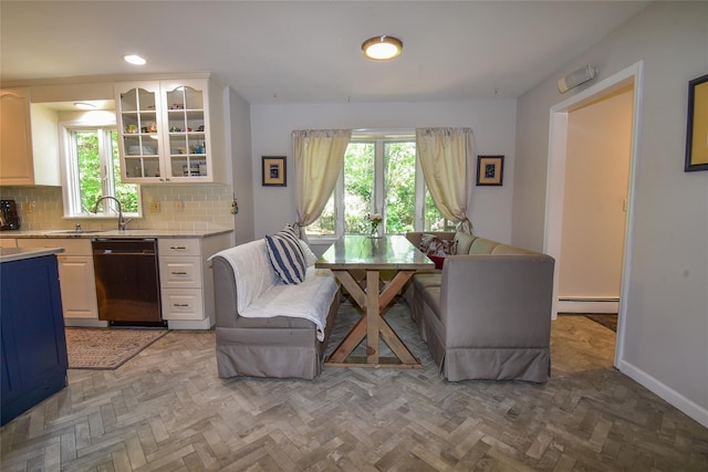 12 Cordwood Path, Shoreham, NY 11786 - dining area featuring baseboard heating, plenty of natural light, baseboards, and recessed lighting