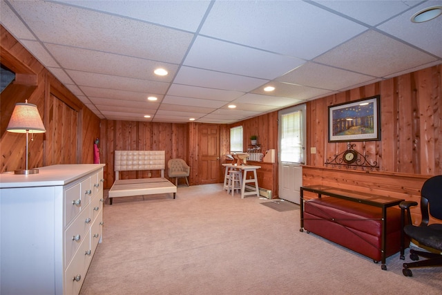 12 Cordwood Path, Shoreham, NY 11786 - sitting room with light colored carpet, wooden walls, recessed lighting, and a paneled ceiling