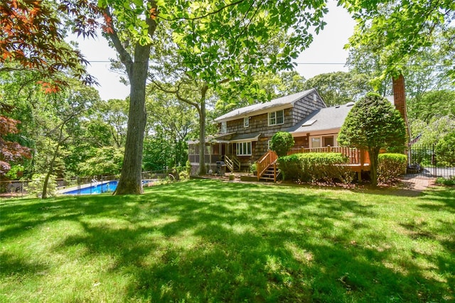 12 Cordwood Path, Shoreham, NY 11786 - back of property featuring a wooden deck and a chimney