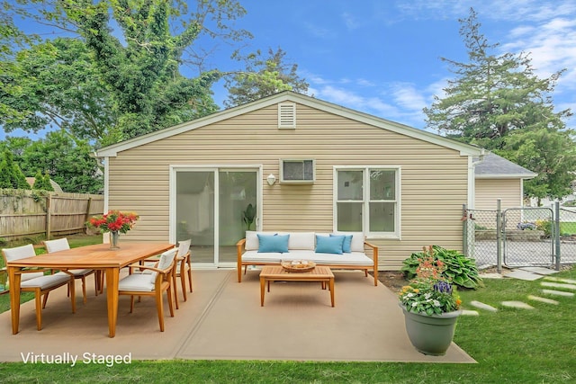 138 Greene Ave, Port Jefferson Station, NY 11776 - back of property featuring outdoor lounge area, a patio, outdoor dining area, and a gate