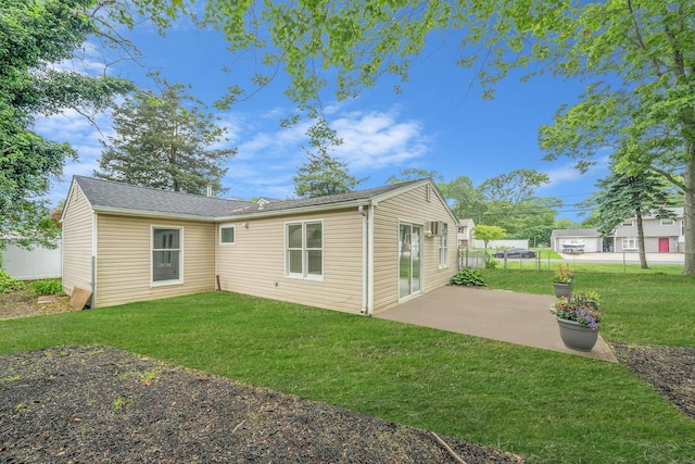138 Greene Ave, Port Jefferson Station, NY 11776 - back of property with a patio