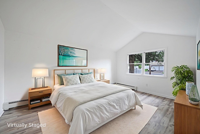 138 Greene Ave, Port Jefferson Station, NY 11776 - bedroom featuring a baseboard heating unit, vaulted ceiling, wood finished floors, and baseboards