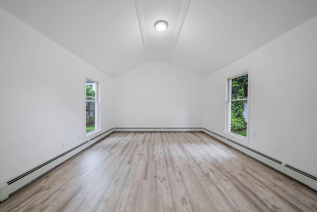 138 Greene Ave, Port Jefferson Station, NY 11776 - additional living space with vaulted ceiling, wood finished floors, and a baseboard heating unit