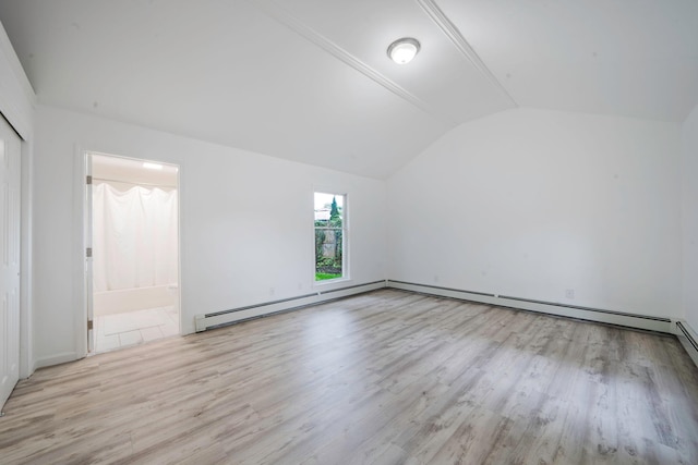 138 Greene Ave, Port Jefferson Station, NY 11776 - bonus room with vaulted ceiling, wood finished floors, a baseboard radiator, and baseboards