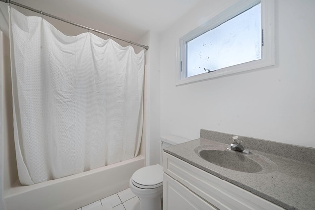 138 Greene Ave, Port Jefferson Station, NY 11776 - bathroom featuring shower / bathtub combination with curtain, toilet, vanity, and tile patterned floors