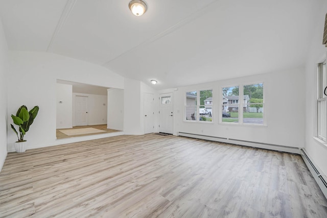 138 Greene Ave, Port Jefferson Station, NY 11776 - unfurnished living room with vaulted ceiling, wood finished floors, and a baseboard heating unit