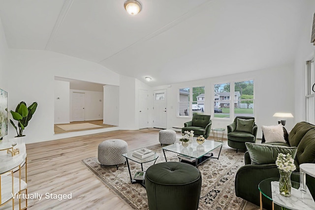 138 Greene Ave, Port Jefferson Station, NY 11776 - living room featuring vaulted ceiling, wood finished floors, and baseboard heating