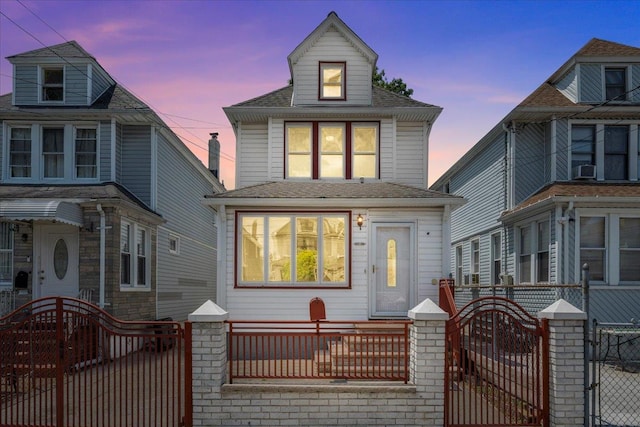 11148 128th St, South Ozone Park, NY 11420 - traditional style home with a gate and a fenced front yard