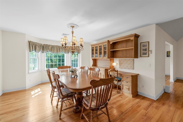 16 Hidden View Dr, Newburgh, NY 12550 - dining space with a chandelier, light wood-type flooring, and baseboards